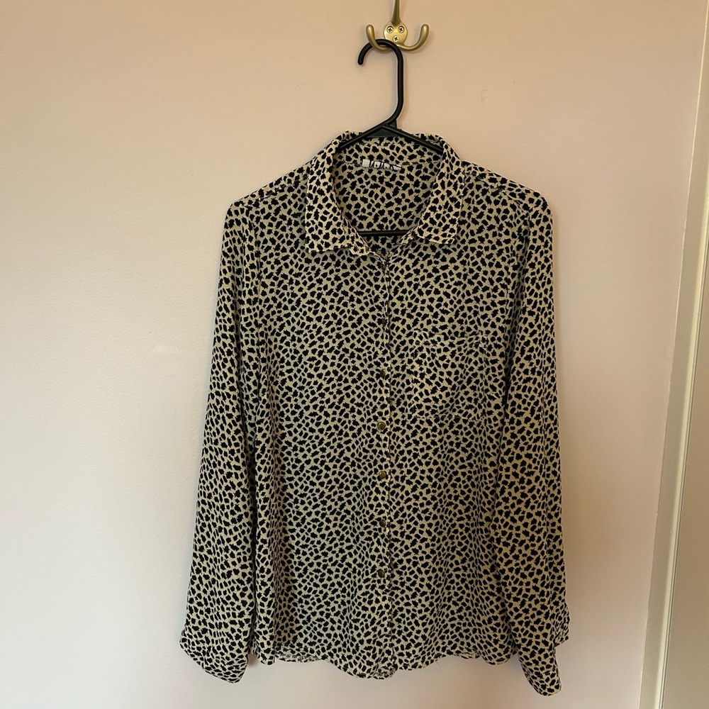 Woman’s Black and Cream Patterned Blouse